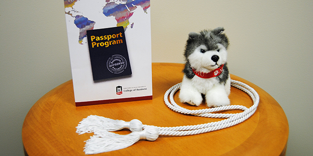 Passport Scholar white cord and certificate
